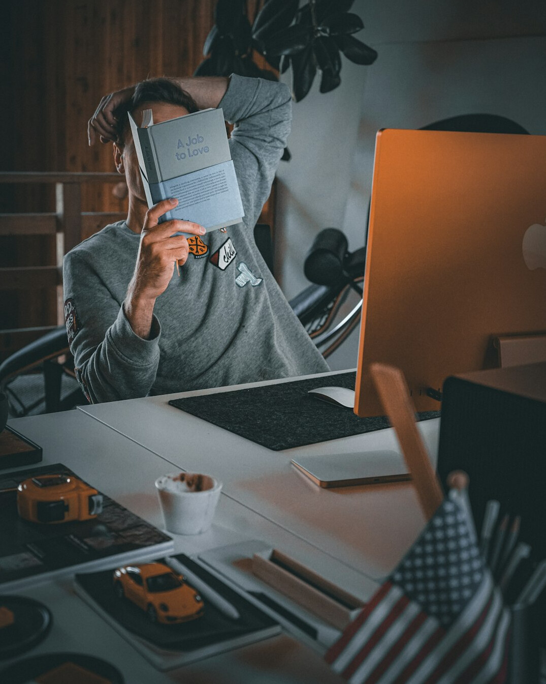 author at desk with notebook